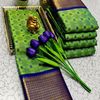 Kayal Premium Soft Silk Saree rich green with navy blue mixed color body adorned with subtle checkered motifs and a striking contrast navy blue border  - EMERALD COLOUR