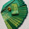 A "one gram gold trending tissue saree" typically refers to a saree made from a lightweight, sheer fabric known as tissue - EMERALD COLOUR