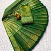 A "one gram gold trending tissue saree" typically refers to a saree made from a lightweight, sheer fabric known as tissue - GREEN COLOUR
