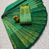 A "one gram gold trending tissue saree" typically refers to a saree made from a lightweight, sheer fabric known as tissue - EMERALD COLOUR (1)