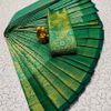 A "one gram gold trending tissue saree" typically refers to a saree made from a lightweight, sheer fabric known as tissue - NORMAL GREEN (1)