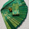 A "one gram gold trending tissue saree" typically refers to a saree made from a lightweight, sheer fabric known as tissue - EMERALD COLOUR (3)