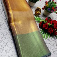 JYOTHIKA INSPIRED TRENDING TISSUE SILK SAREE