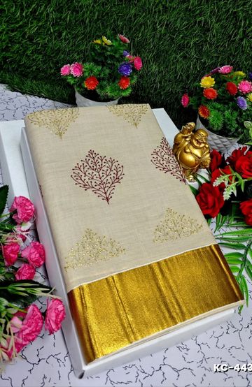 TRENDING KERALA SPECIAL FULL WORK EMBOSSED DIGITAL PRINTING TISSUE SAREE COLLECTIONS - IVORY COLOUR (19)