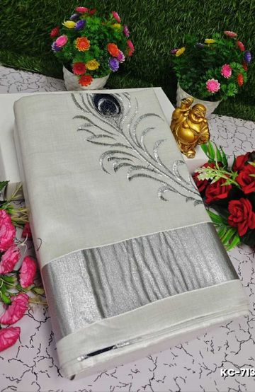 TRENDING KERALA SPECIAL FULL WORK EMBOSSED DIGITAL PRINTING TISSUE SAREE COLLECTIONS - WHITE (39)