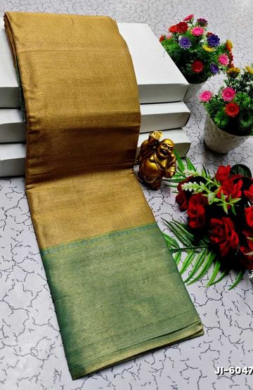 JYOTHIKA INSPIRED TRENDING  LINEN TISSUE TYPE  SILK SAREES WITH GREEN BORDER - GOLD