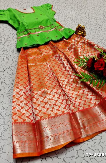 FESTIVAL AND FUNCTION WEAR TRADITIONAL KIDS PATTU PAVADAI STONE WORK DESIGN - GREEN COLOUR