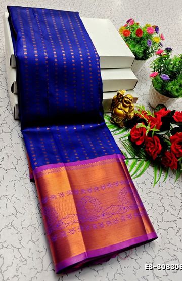 A "one gram gold trending tissue saree" typically refers to a saree made from a lightweight, sheer fabric known as tissue - EMERALD COLOUR (4)