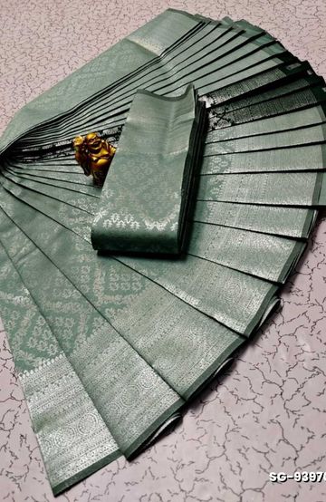 A "one gram gold trending tissue saree" typically refers to a saree made from a lightweight, sheer fabric known as tissue - EMERALD COLOUR (4)
