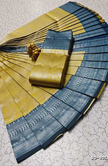 A "one gram gold trending tissue saree" typically refers to a saree made from a lightweight, sheer fabric known as tissue - EMERALD COLOUR (4)