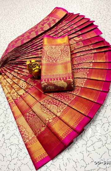 A "one gram gold trending tissue saree" typically refers to a saree made from a lightweight, sheer fabric known as tissue - DARK PINK (3)