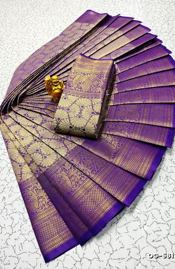 A "one gram gold trending tissue saree" typically refers to a saree made from a lightweight, sheer fabric known as tissue - LAVENDER DARK (3)