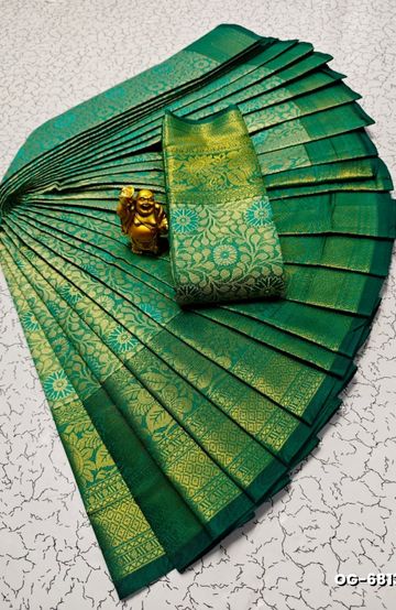 A "one gram gold trending tissue saree" typically refers to a saree made from a lightweight, sheer fabric known as tissue - NORMAL GREEN (1)