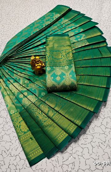A "one gram gold trending tissue saree" typically refers to a saree made from a lightweight, sheer fabric known as tissue - EMERALD COLOUR (3)