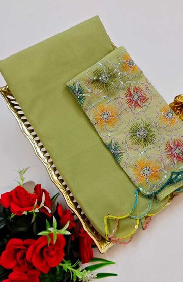 A "one gram gold trending tissue saree" typically refers to a saree made from a lightweight, sheer fabric known as tissue - INDIGO COLOUR (3)