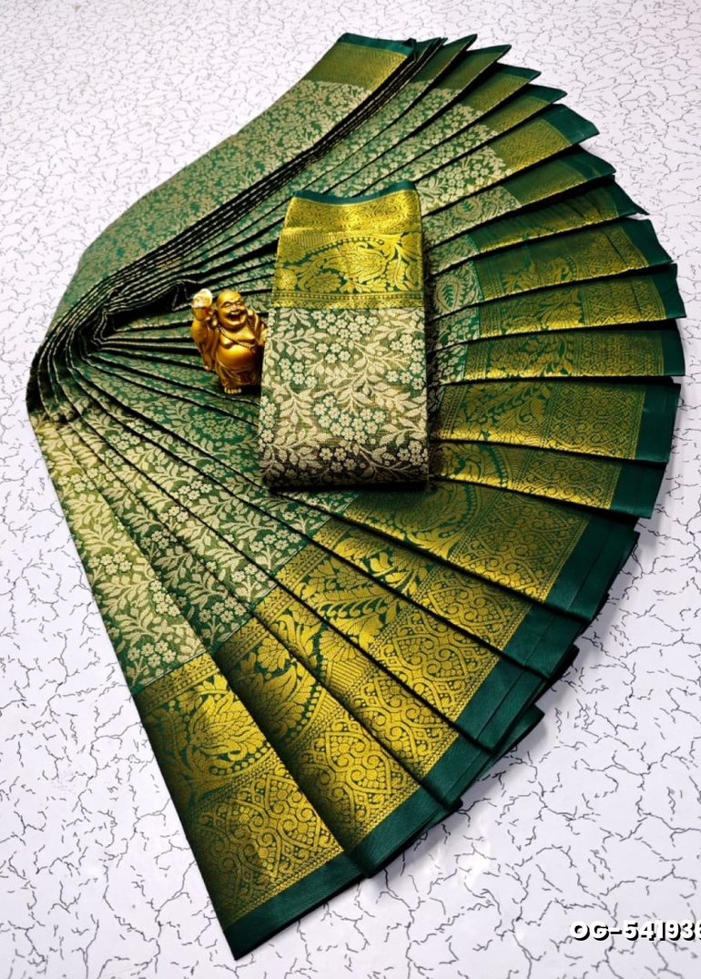 A "one gram gold trending tissue saree" typically refers to a saree made from a lightweight, sheer fabric known as tissue - BOTTLE GREEN