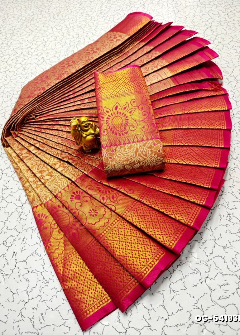 A "one gram gold trending tissue saree" typically refers to a saree made from a lightweight, sheer fabric known as tissue - DARK PINK