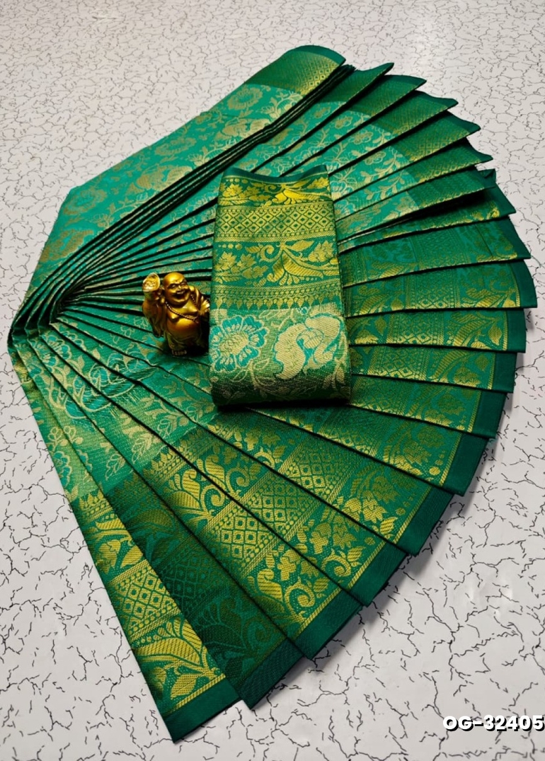 A "one gram gold trending tissue saree" typically refers to a saree made from a lightweight, sheer fabric known as tissue - NORMAL GREEN
