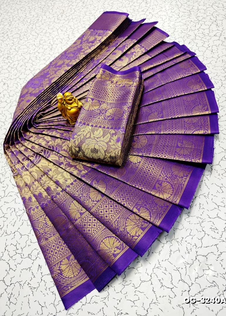 A "one gram gold trending tissue saree" typically refers to a saree made from a lightweight, sheer fabric known as tissue - LAVENDER DARK (2)