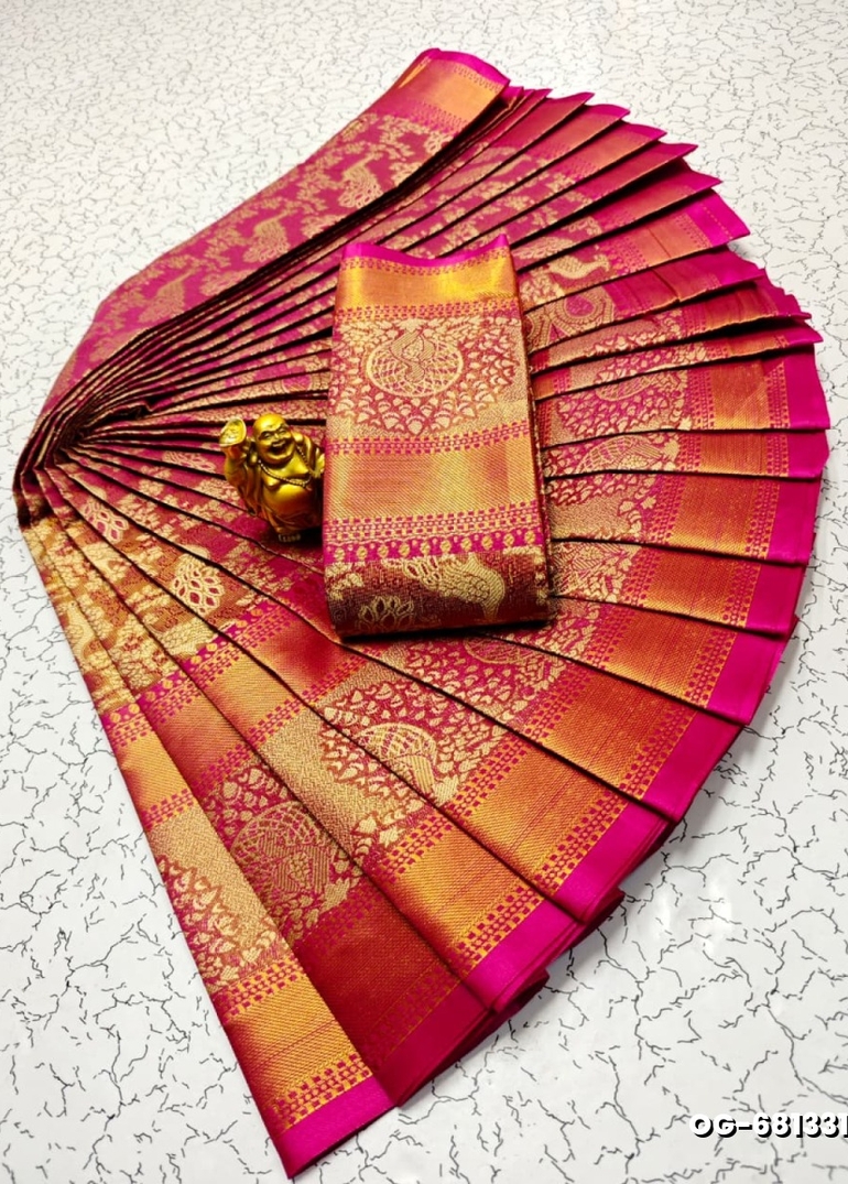 A "one gram gold trending tissue saree" typically refers to a saree made from a lightweight, sheer fabric known as tissue - DARK PINK (3)