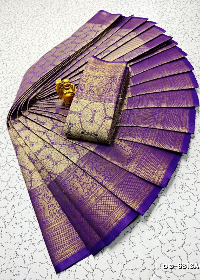 A "one gram gold trending tissue saree" typically refers to a saree made from a lightweight, sheer fabric known as tissue - LAVENDER DARK (3)