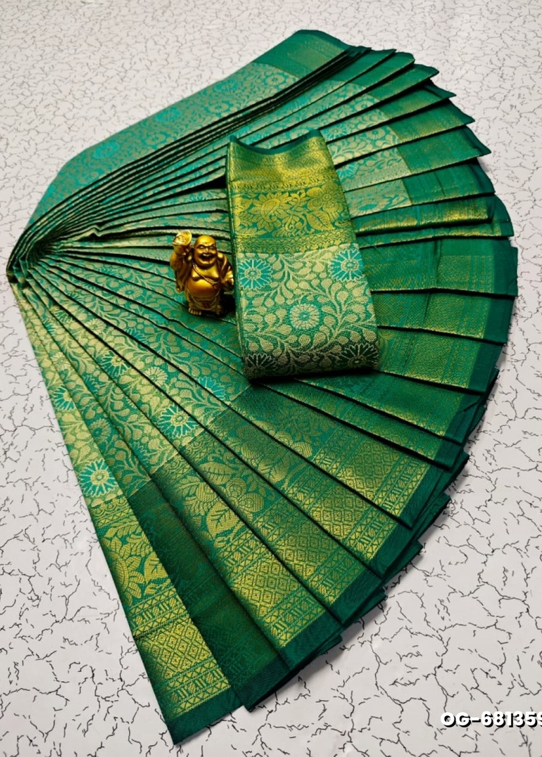 A "one gram gold trending tissue saree" typically refers to a saree made from a lightweight, sheer fabric known as tissue - NORMAL GREEN (1)
