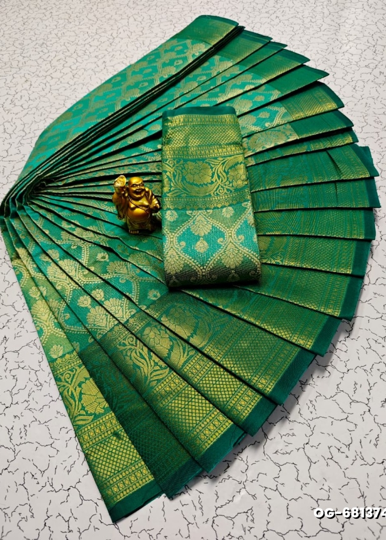 A "one gram gold trending tissue saree" typically refers to a saree made from a lightweight, sheer fabric known as tissue - EMERALD COLOUR (3)