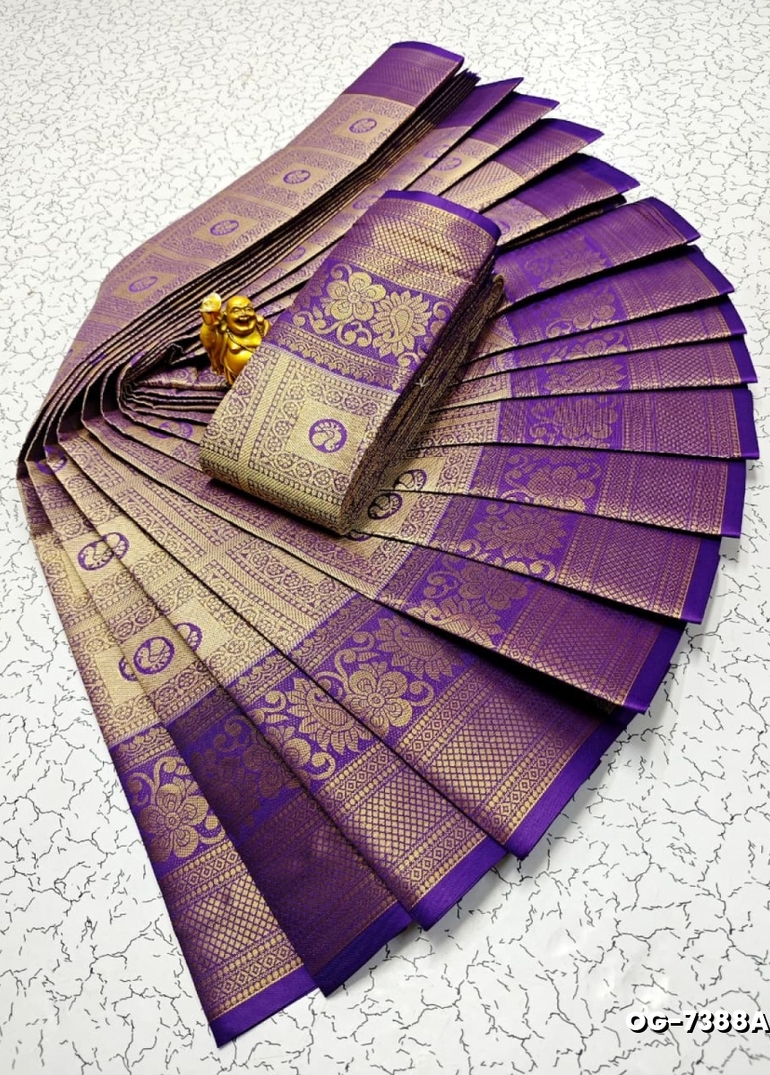 A "one gram gold trending tissue saree" typically refers to a saree made from a lightweight, sheer fabric known as tissue - LAVENDER DARK (4)