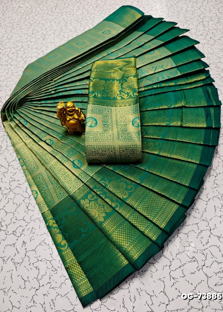 A "one gram gold trending tissue saree" typically refers to a saree made from a lightweight, sheer fabric known as tissue - NORMAL GREEN (2)