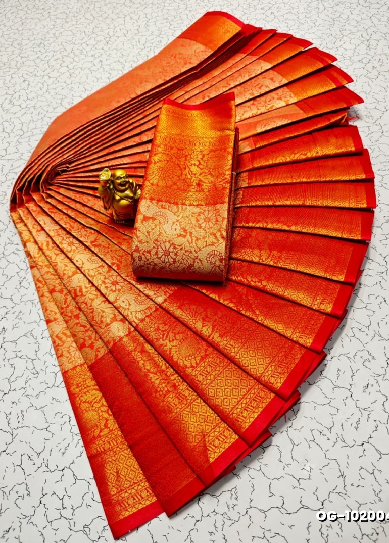 A "one gram gold trending tissue saree" typically refers to a saree made from a lightweight, sheer fabric known as tissue - RED (5)