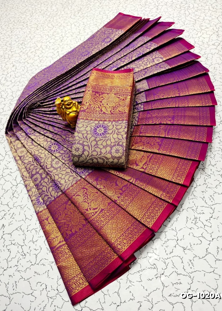 A "one gram gold trending tissue saree" typically refers to a saree made from a lightweight, sheer fabric known as tissue - LAVENDER DARK (5)