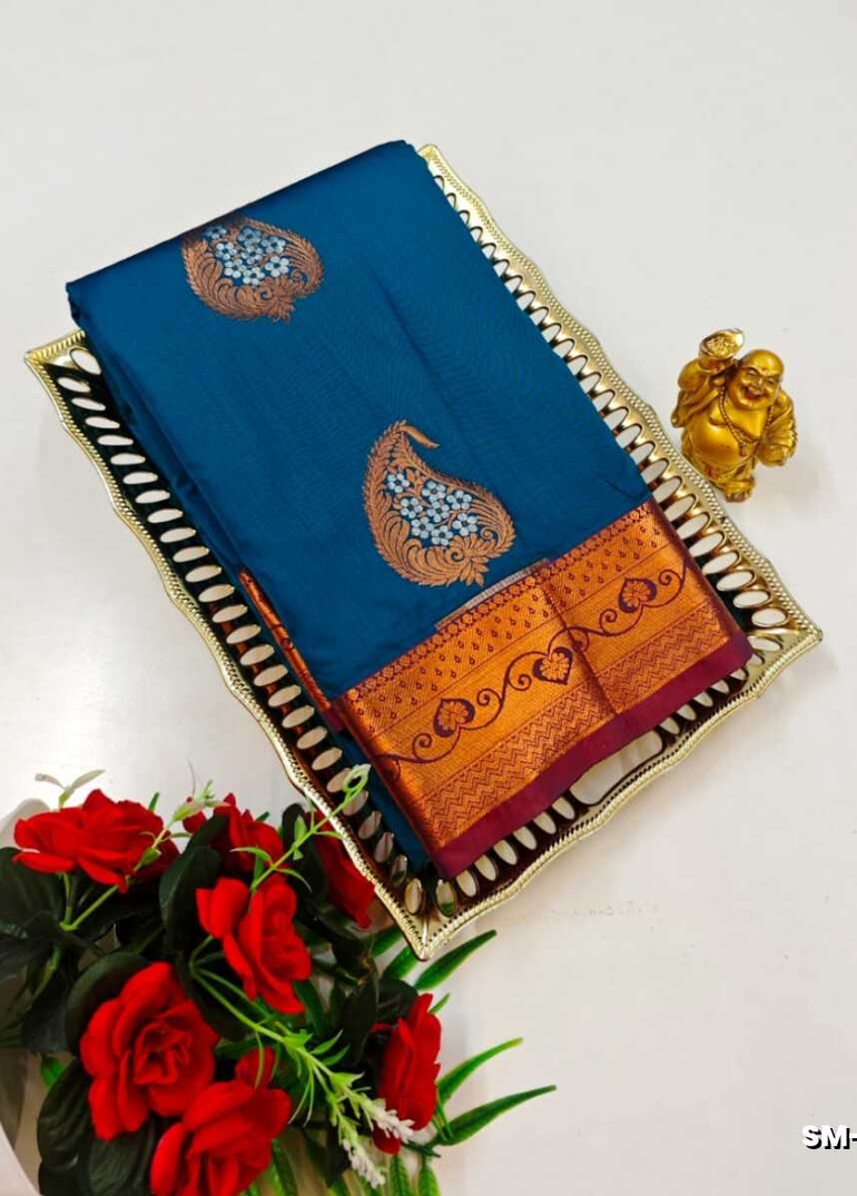 A modern take on the multi-colored nature of the meena zari work sarees - PEACKOK BLUE