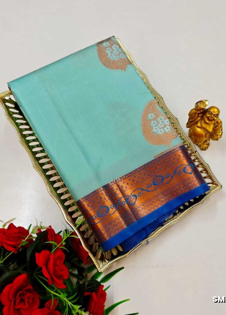 A modern take on the multi-colored nature of the meena zari work sarees - ICE BLUE
