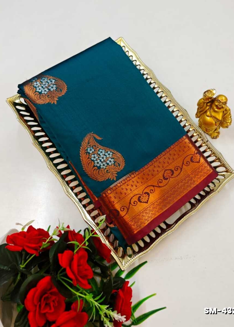 A modern take on the multi-colored nature of the meena zari work sarees - PEACOCK BLUE