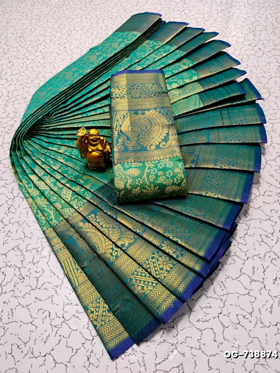 A "one gram gold trending tissue saree" typically refers to a saree made from a lightweight, sheer fabric known as tissue - EMERALD COLOUR (4)