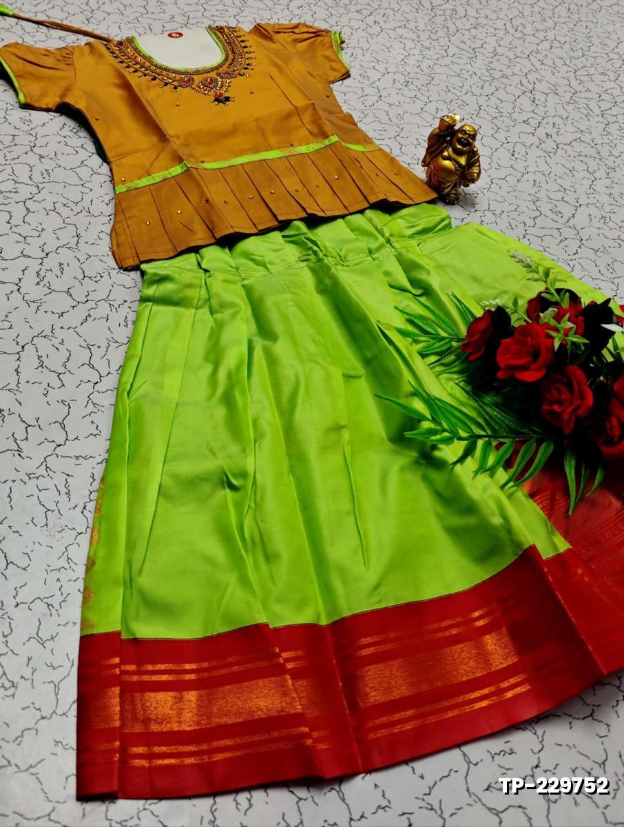 FESTIVAL AND FUNCTION WEAR TRADITIONAL KIDS PATTU PAVADAI STONE WORK DESIGN - VENTHAYA COLOUR