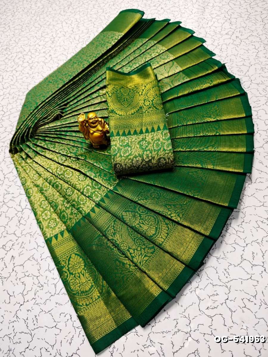 A "one gram gold trending tissue saree" typically refers to a saree made from a lightweight, sheer fabric known as tissue - GREEN COLOUR