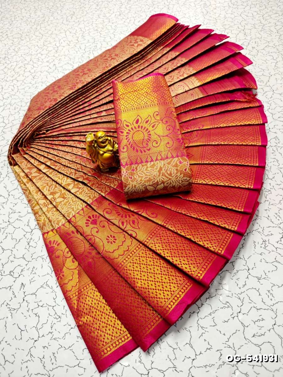 A "one gram gold trending tissue saree" typically refers to a saree made from a lightweight, sheer fabric known as tissue - DARK PINK