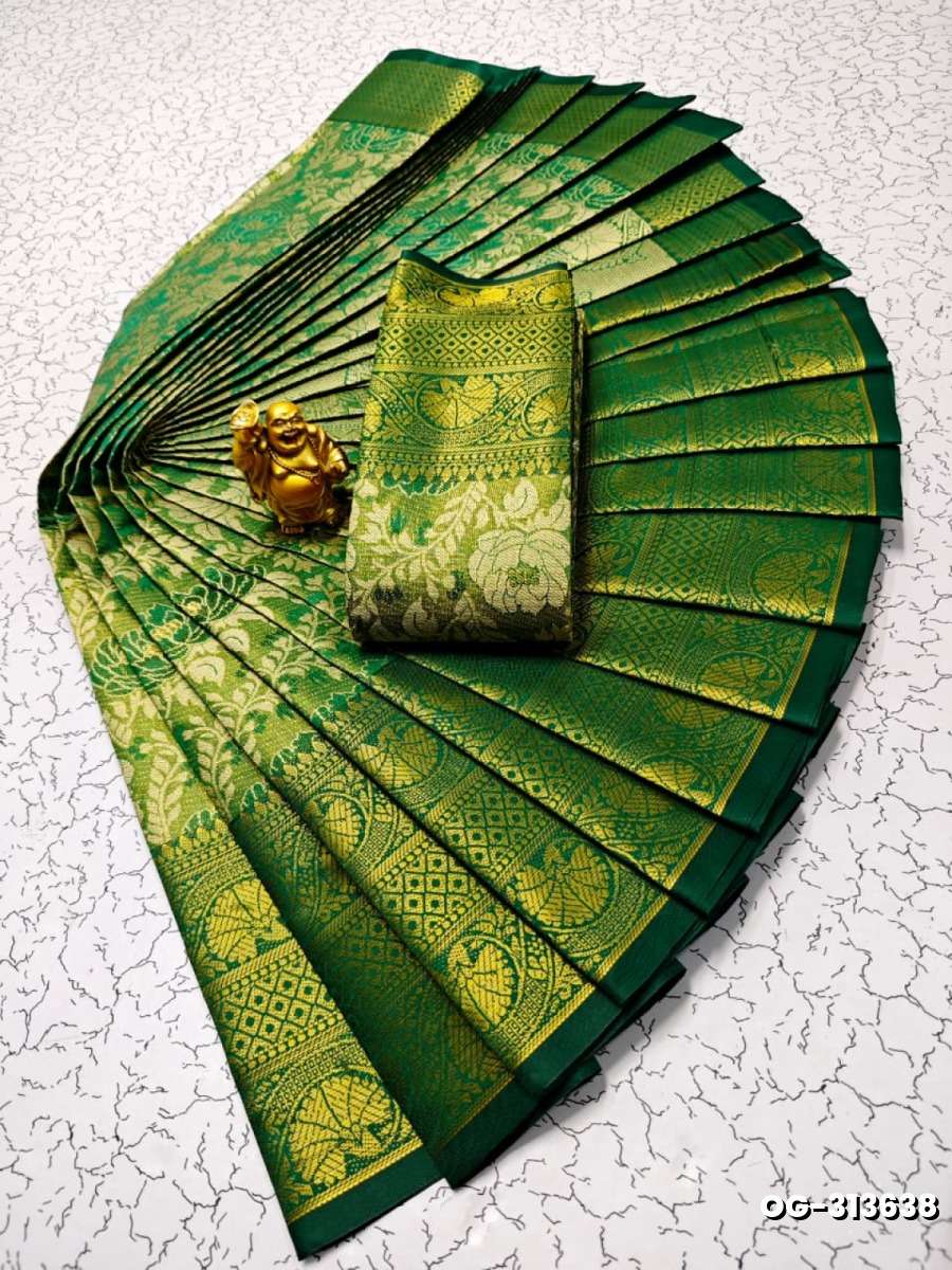 A "one gram gold trending tissue saree" typically refers to a saree made from a lightweight, sheer fabric known as tissue - DARK GREEN (1)