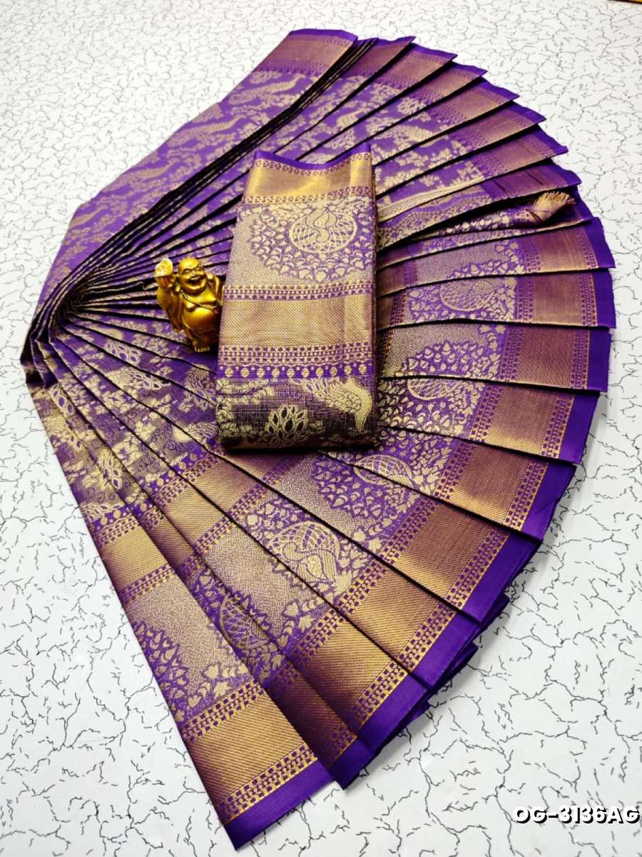 A "one gram gold trending tissue saree" typically refers to a saree made from a lightweight, sheer fabric known as tissue - LAVENDER DARK (1)