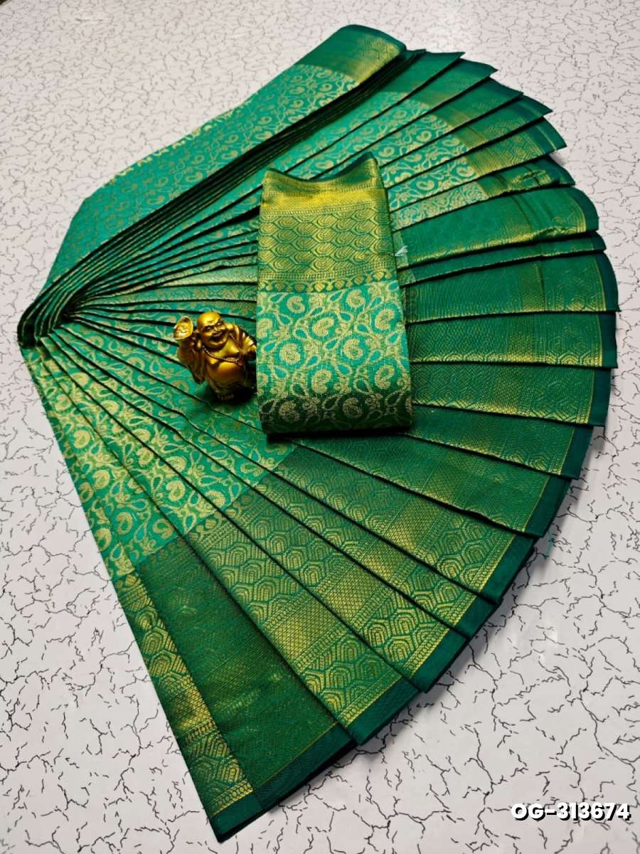 A "one gram gold trending tissue saree" typically refers to a saree made from a lightweight, sheer fabric known as tissue - EMERALD COLOUR (1)