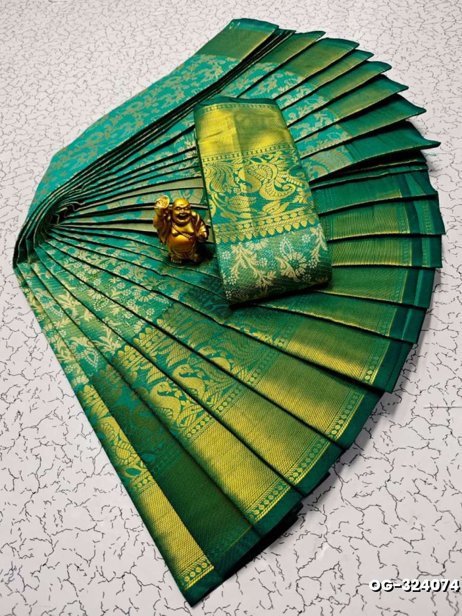 A "one gram gold trending tissue saree" typically refers to a saree made from a lightweight, sheer fabric known as tissue - EMERALD COLOUR (2)