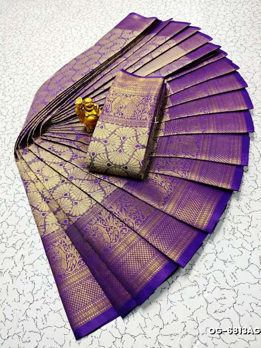 A "one gram gold trending tissue saree" typically refers to a saree made from a lightweight, sheer fabric known as tissue - LAVENDER DARK (3)