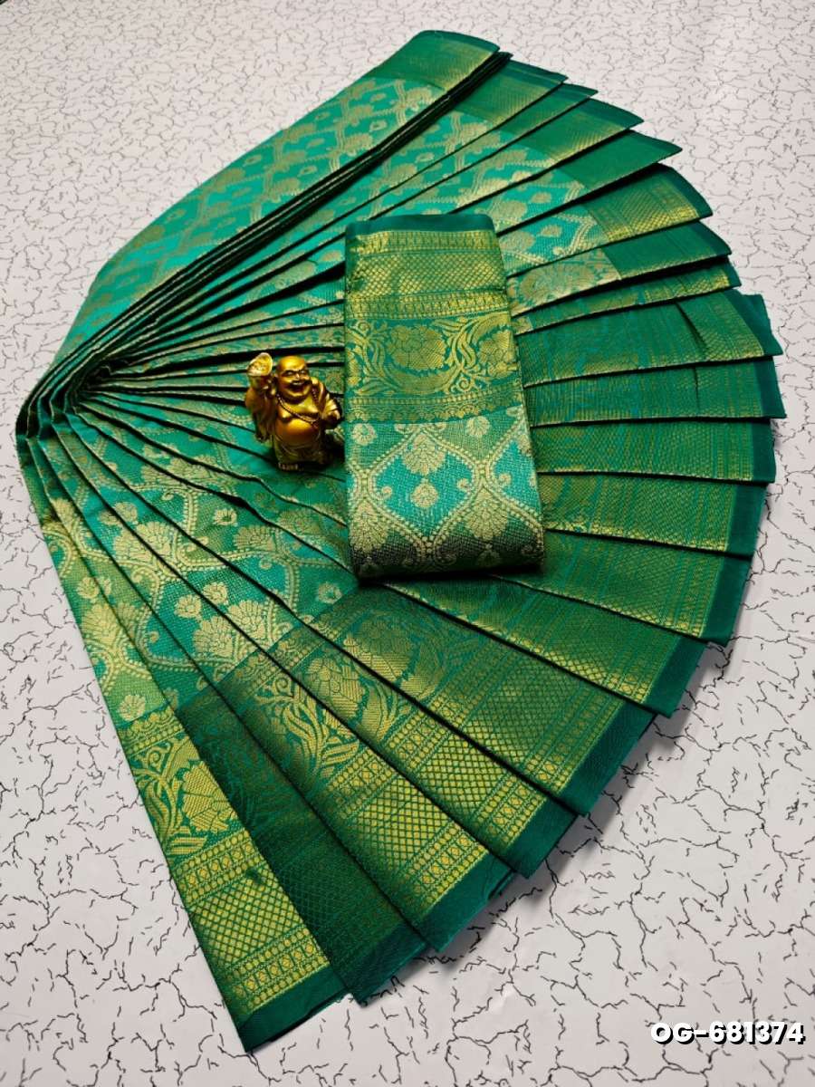 A "one gram gold trending tissue saree" typically refers to a saree made from a lightweight, sheer fabric known as tissue - EMERALD COLOUR (3)