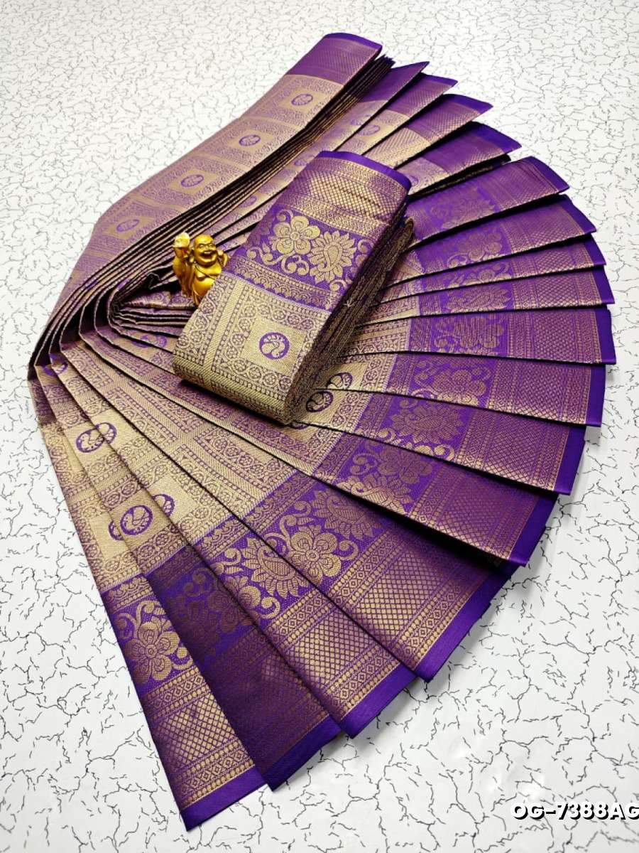 A "one gram gold trending tissue saree" typically refers to a saree made from a lightweight, sheer fabric known as tissue - LAVENDER DARK (4)