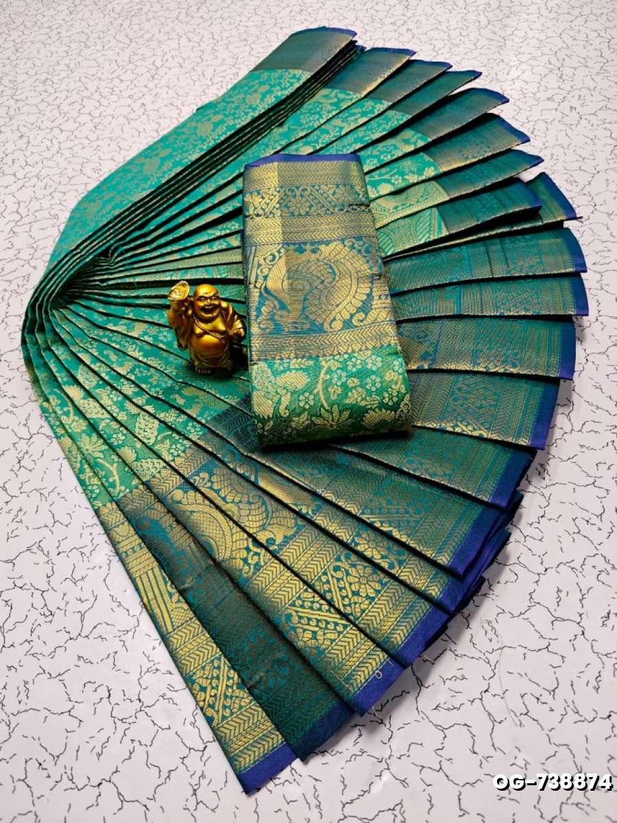 A "one gram gold trending tissue saree" typically refers to a saree made from a lightweight, sheer fabric known as tissue - EMERALD COLOUR (4)