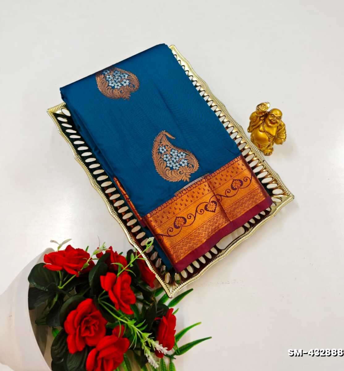 A modern take on the multi-colored nature of the meena zari work sarees - PEACKOK BLUE